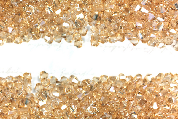 Golden shadow Swarovski crystal bicones background for blog